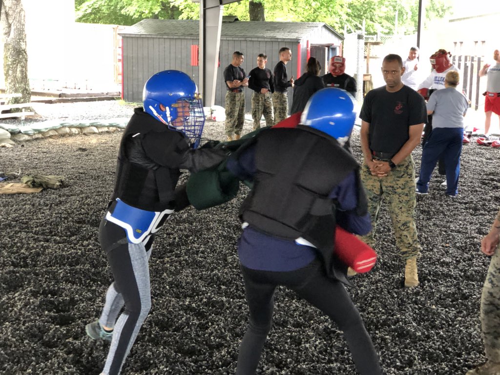 MCRCPAO's tweet photo. @eharman13 (left) @barvenia coaches collide in pugil sticks at coaches workshop. Pugil sticks teach coaches confidence in confrontation. https://t.co/9KJql9zAcb
