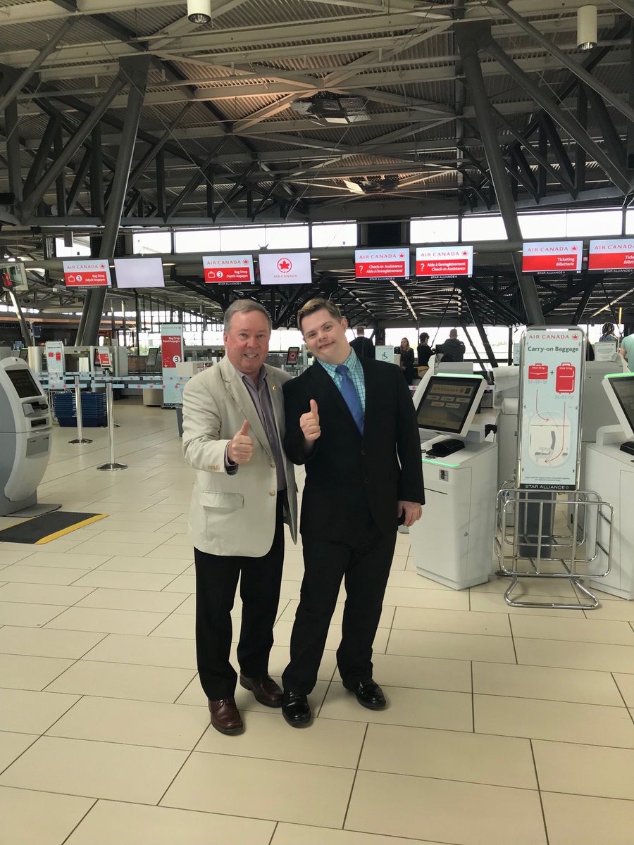SenatorMunson's tweet photo. The journey begins. It is Michael’s first plane trip.Mike Trinque has worked for me in the Senate for 7 years. We are off to Hamilton for the annual National Down Syndrome Conference. He is a guest speaker-See the Ability @CdnDownSyndrome @SenateCA https://t.co/f4YFFN9FO0