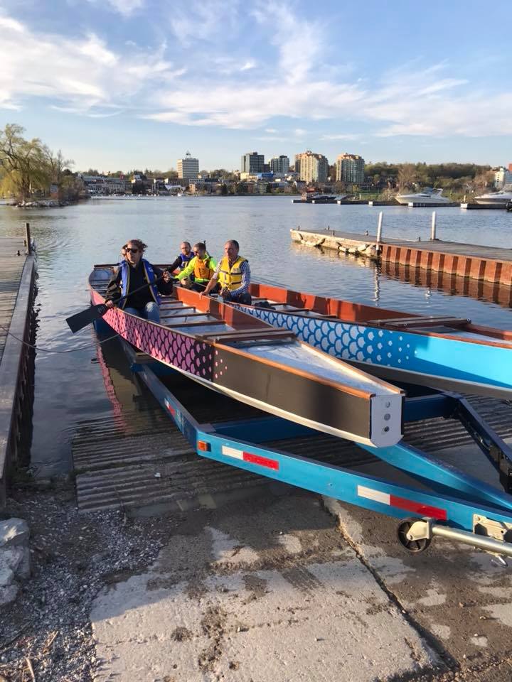 BarrieDBFest's tweet photo. If you missed it on Facebook, our first two boats are in!! 😀Thanks to @DragonBoatRocks for paddling them over to their summer dock. Paddles up! #BarrieDragonBoatFestival #BDBF2018 🐲🛶 https://t.co/6pfPYM6QxN