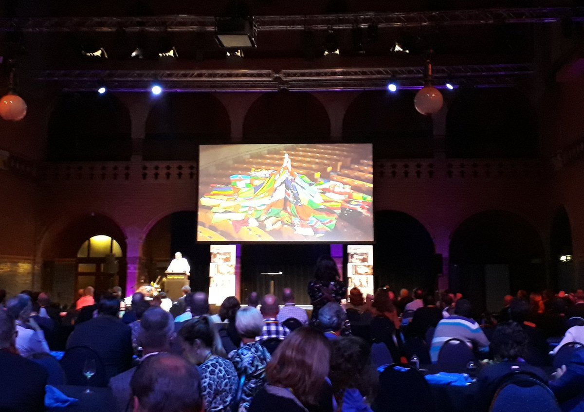 LGBTIintergroup's tweet photo. Yesterday @Europarl_EN in #Brussels, today in #Amsterdam @WorkplacePride #WPCON2018... the @amsterdamdress made of the flags of 75 countries with #statesponsoredhomophobia #travels the world to raise awareness about #LGBTI phobic #persecution #wearehuman #LGBTIasylum https://t.co/Kt1Sespa5F