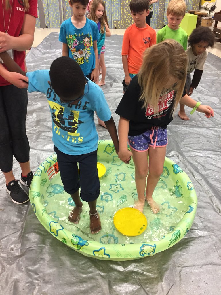 MrsD_FunInFirst's tweet photo. @TillmanSchool #fieldday Our second station is Panning For Gold. The kids are picking up marbles with their toes and collecting them on a frisbee. https://t.co/NQhnDBzJaz