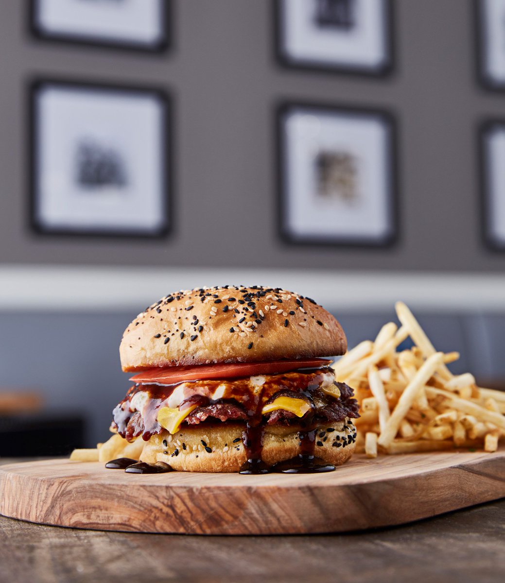 All it takes is a dash of creativity and a drizzle of the magic sauce. The Rez Burger isn't your traditional burger but sometimes we're in the mood for something a little different. Burger details: bit.ly/2wW7CgX #NationalBurgerMonth #TheRezGrill