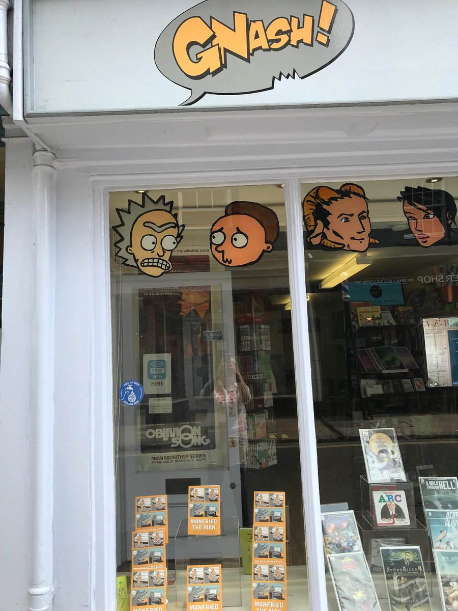 quirkbooks's tweet photo. Check out that awesome @ManfriedtheMan display in the @gnashcomics window! Thanks Gnash, we love this! 🐱 #Manfried https://t.co/NCT4z55tep