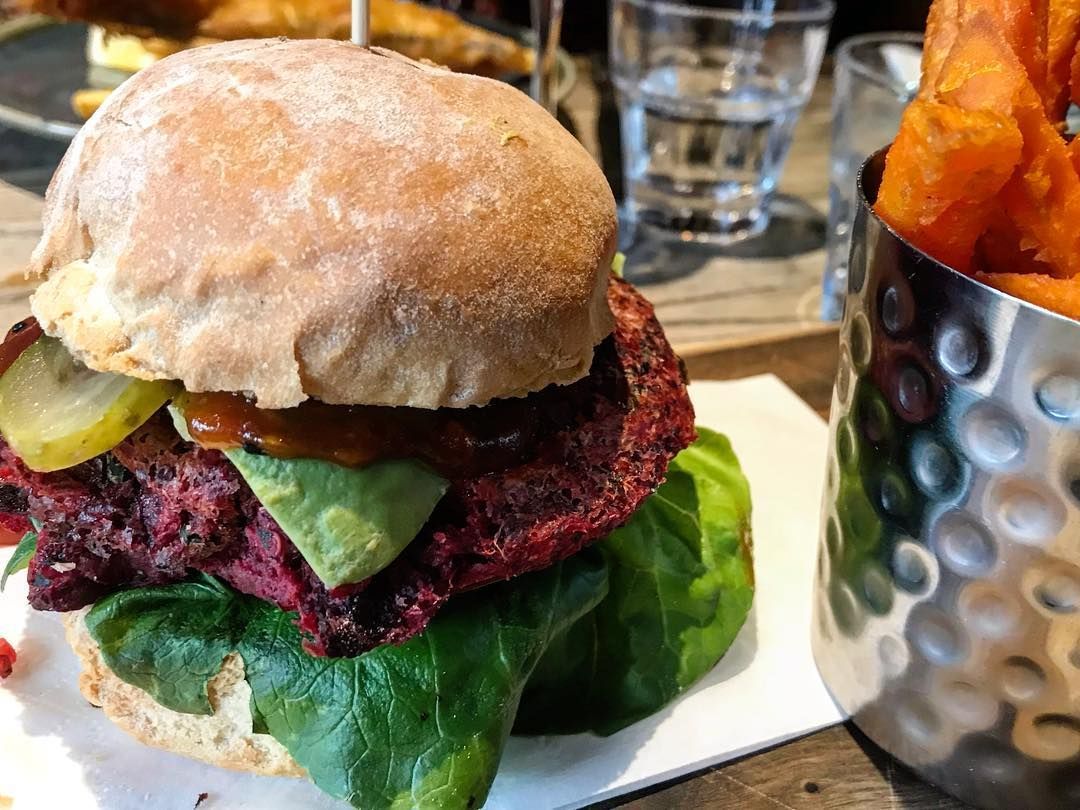 So that's how our beetroot &amp; quinoa burger looks like😋 It's served with avocado, tomato relish, coleslaw &amp; sweet potato fries! Come along try our #veggie burger on this sunny Friday! #FridayFeeIing