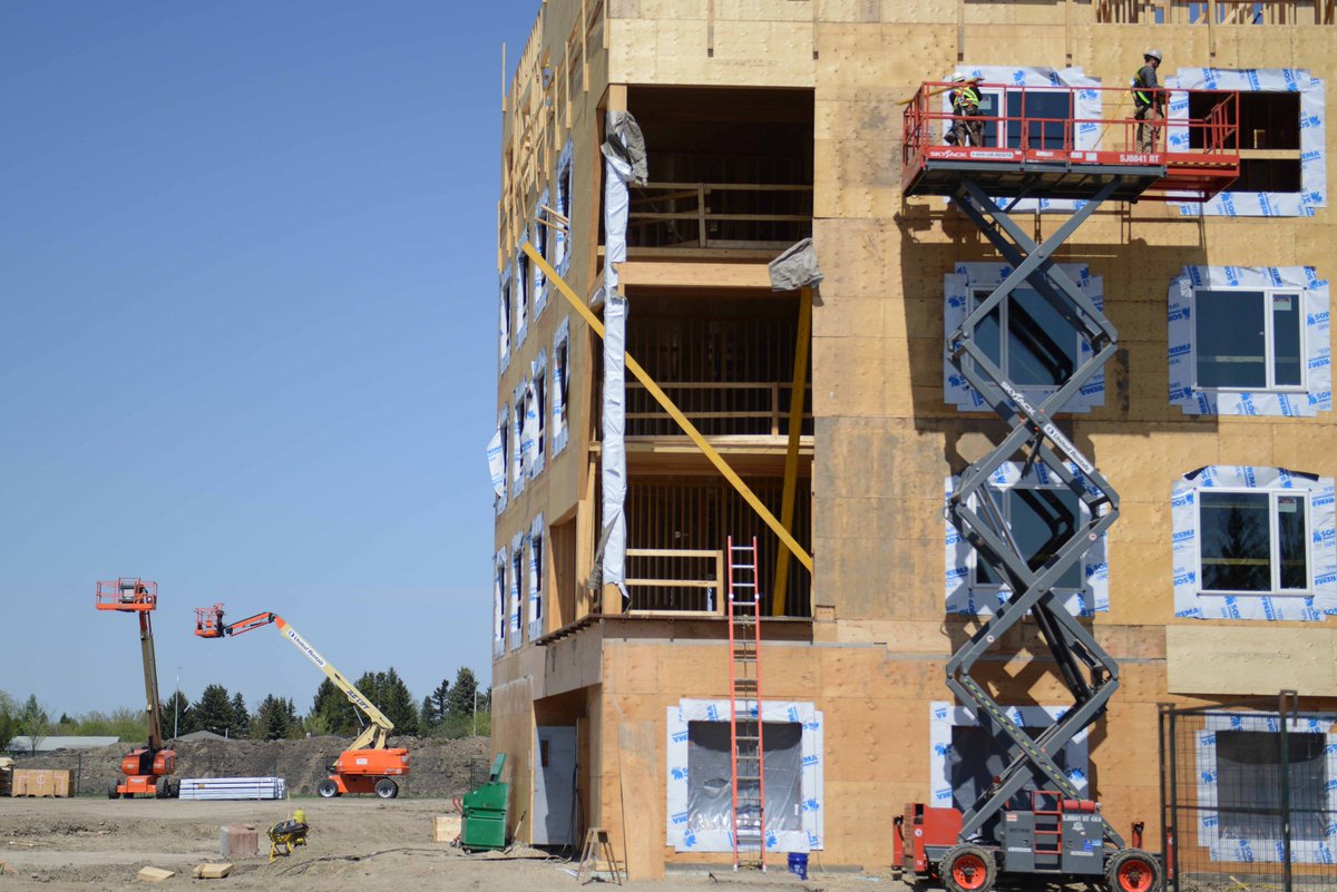 RedDeerPolytech's tweet photo. Construction is progressing on the new RDC Residence! 🔨🏡Work began on the new Residence site in October 2017, with structural foundations complete in December. Since February, above-ground construction has been progressing rapidly. See more here: https://t.co/YiPJ6hImc6 #MyRDC https://t.co/4RocT6C4OR