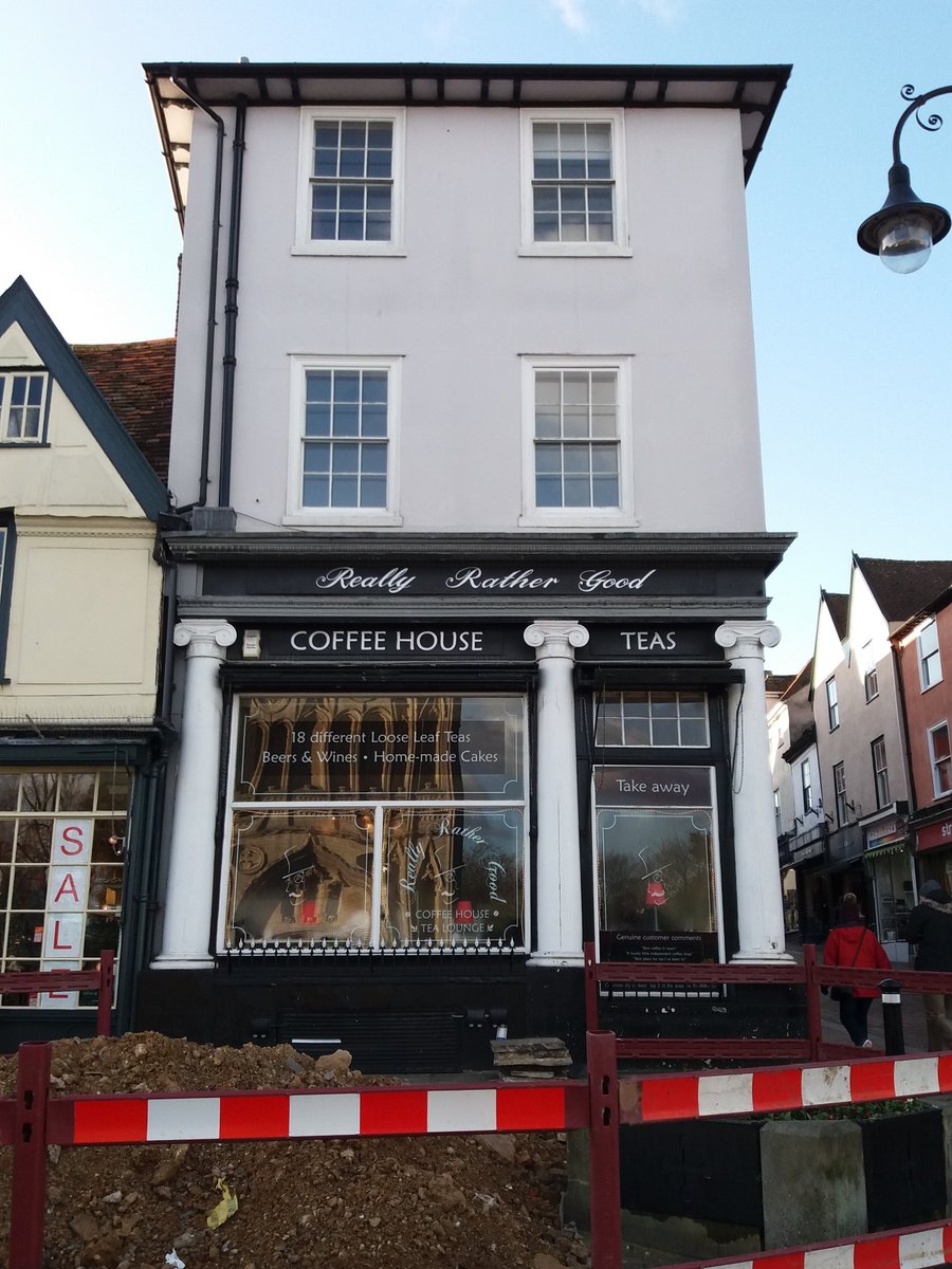 jochneale's tweet photo. "I" is for "Ionic" - one of the five orders of classical architecture, characterised by the volutes of its capitals. Here seen in a shop front on Angel Hill, #BuryStEdmunds #ArchAlpha @HE_EoE https://t.co/fOjlTF0Ax9