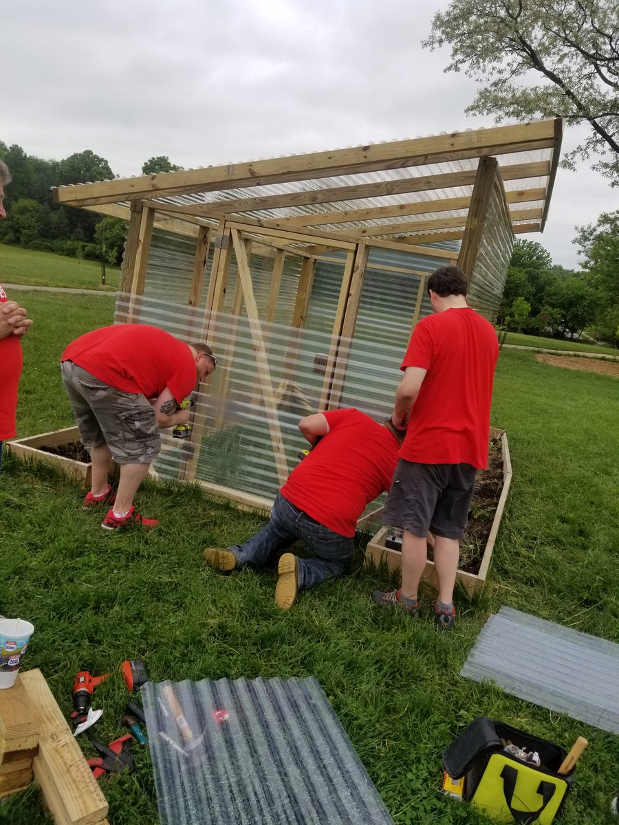 nicsomething's tweet photo. #UCserves greenhouse is getting there! https://t.co/JT405rsWhn