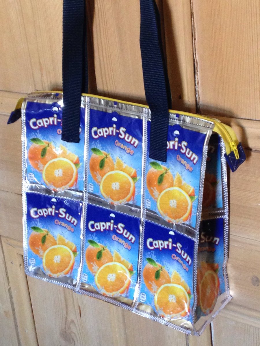 Capri Sun bag, Vegan handbag, Beautiful tote, Eco shoulder bag, Rain proof purse, Upcycled shopper, Womens gifts, Gym bag, Ladies swim bag etsy.me/2BJv0LS #upcycle #shabbysheuk #epiconetsy #craftychaching #craftbuzz #ecogifts #VeganHandbag