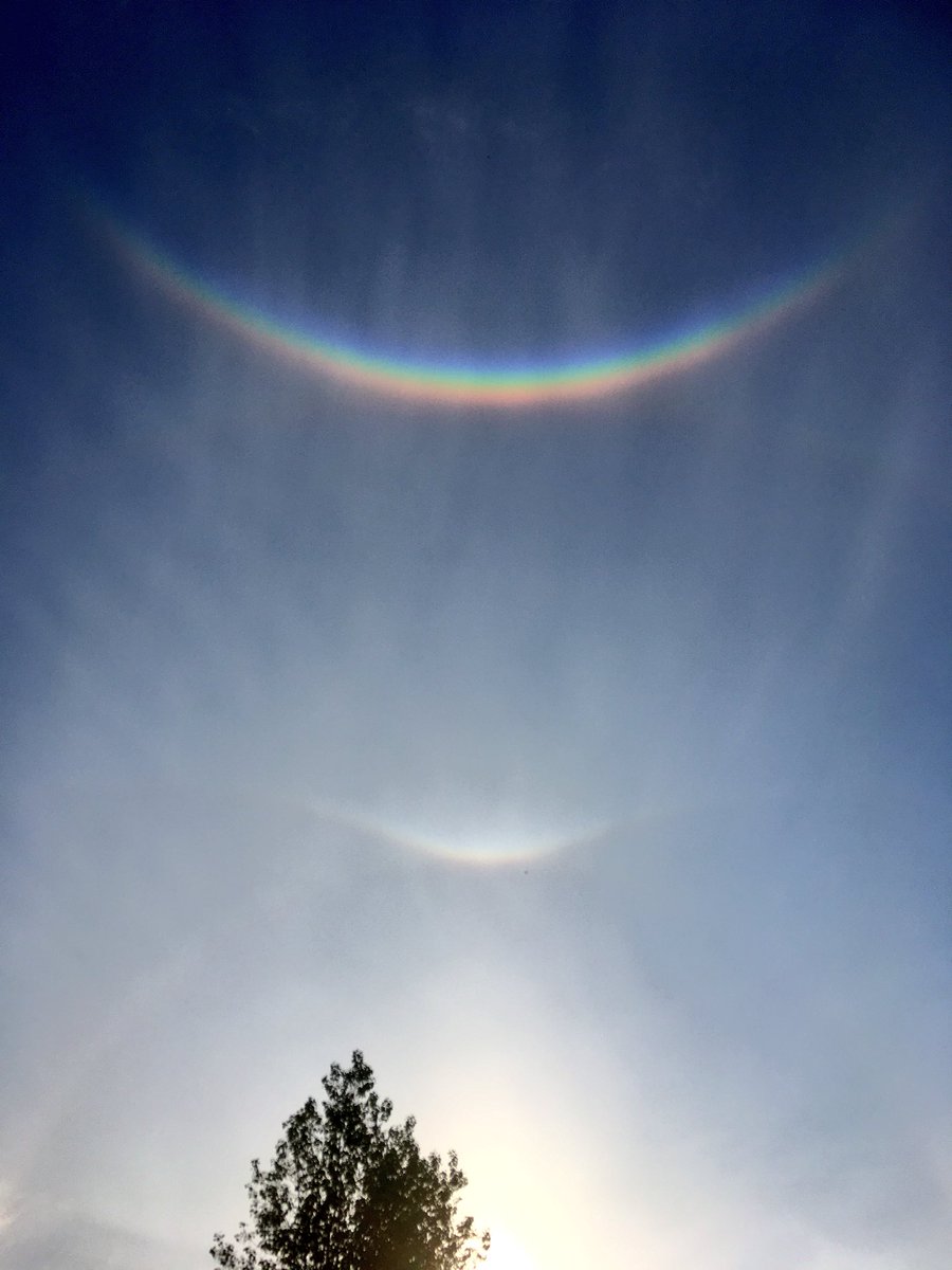 ATDrawsInk's tweet image. A double inverted rainbow sunset hanging high this evening for a bright end to the day. (The lesser rainbow is only just visible above the sun) Google tells me the two flares on each side are called sundogs. @BBCMidsWeather #Derbyshire #weather #meteorology #rainbow #sunset #sky