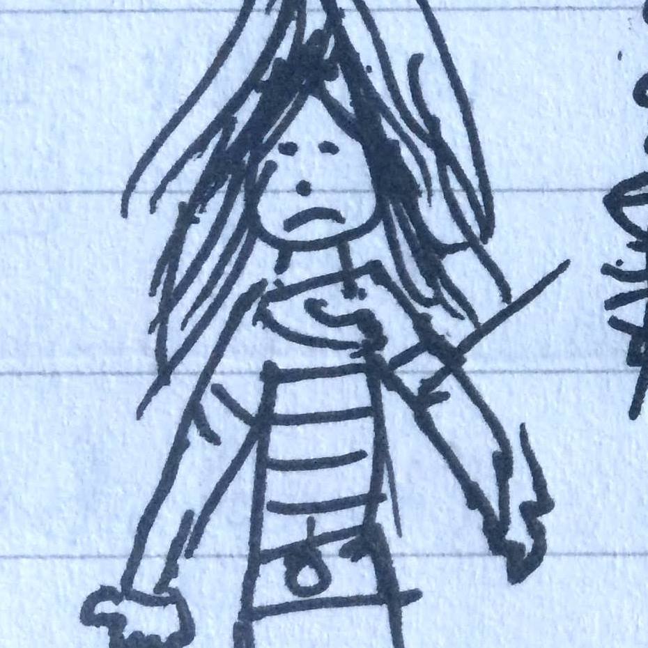 Scribbled drawing of person with long hair on lined paper