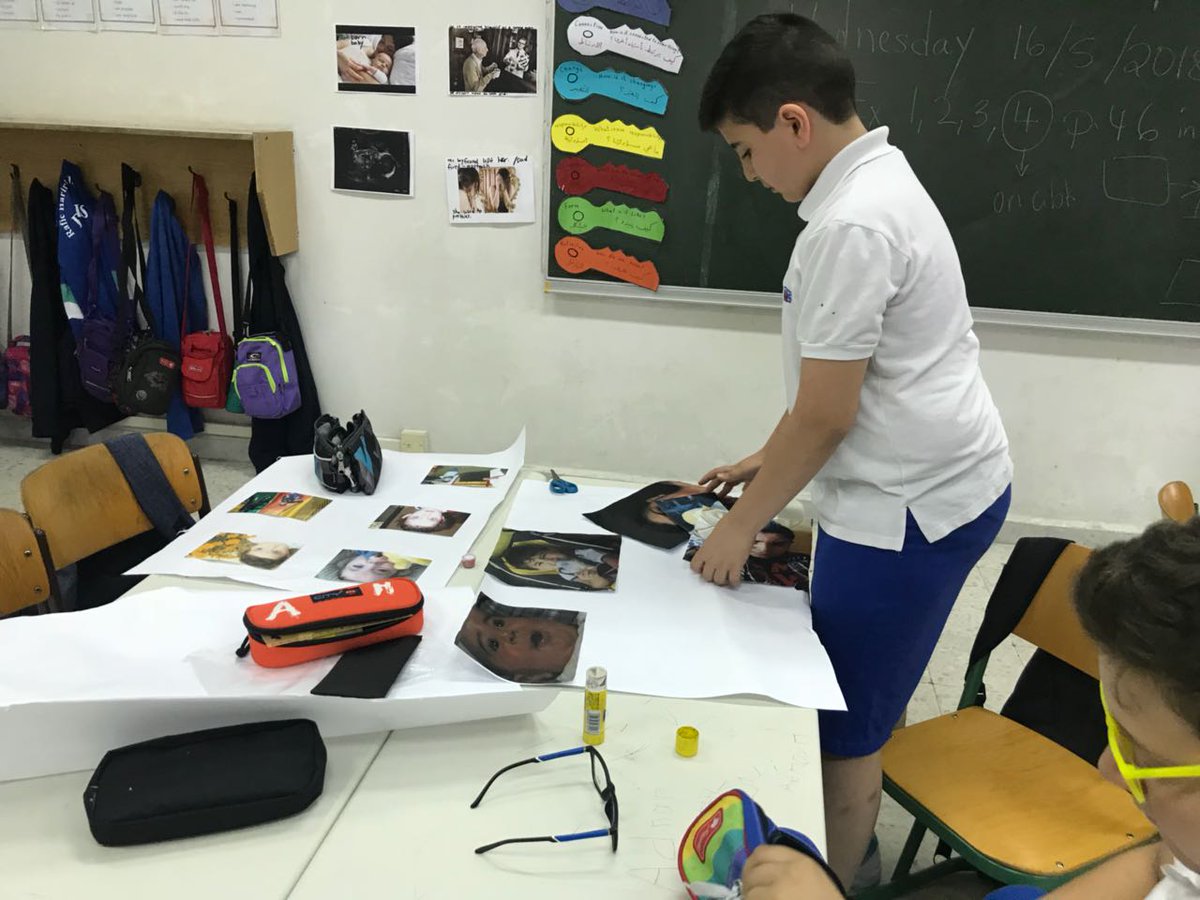 RHHS_Elementary's tweet photo. Grade 5 learners creating a timeline to show the stages of development #self_exploration #change https://t.co/EEkLfTdRdD