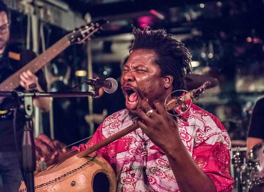 NLFB_festival's tweet photo. On stage at #NLFB2018: Bonsa is from #BurkinaFaso. He's developed his own, energetic, contemporary style on the #koanni, a 2 string bass gourd #banjo. You've never seen/heard anything like it b4. You're gonna love it. Trust us.
Check out the live show: https://t.co/zx2wHgKc8J https://t.co/4TrH0r4rPO