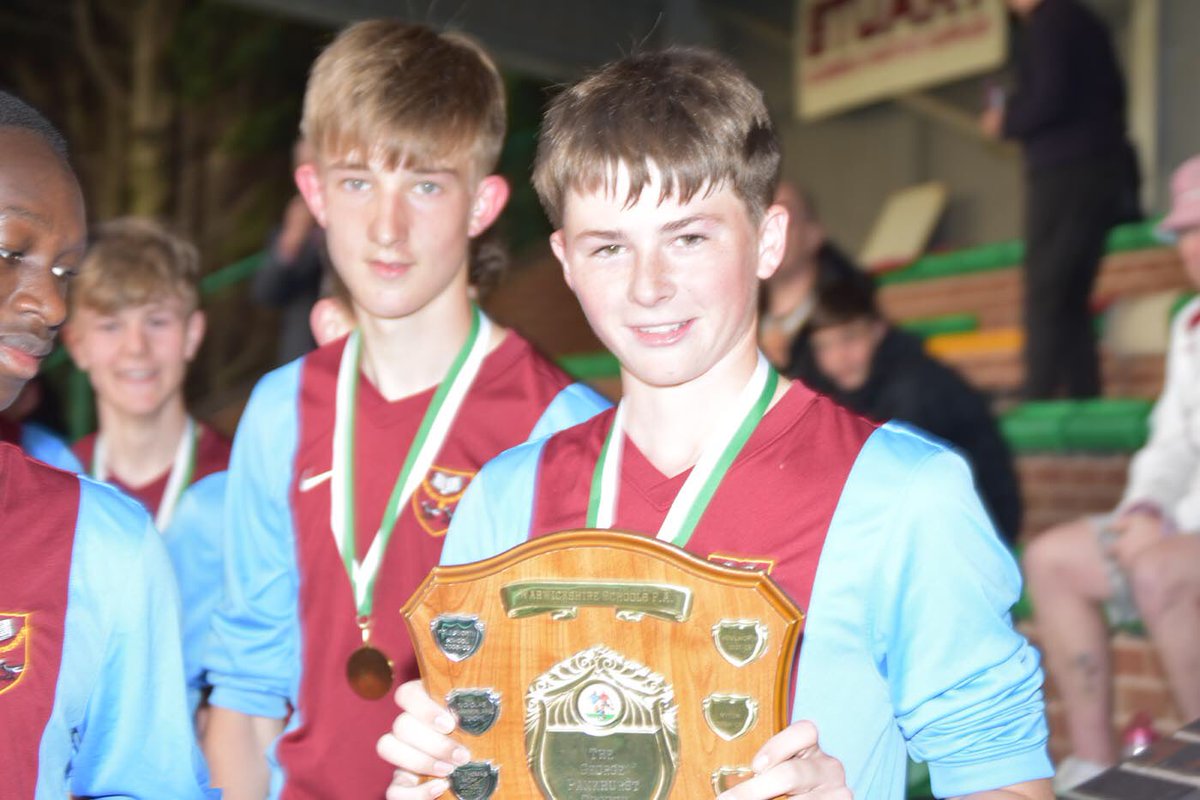 DeptPE's tweet photo. Congratulations to our Under 14 boys who became Warwickshire Cup Champions on Thursday night. They beat @MytonPE 4-1 at the Bedworth Oval. Captain Ryan Howley lifts the trophy after scoring a great hat trick.@StThomasMoreNun https://t.co/zbbC0kxsly