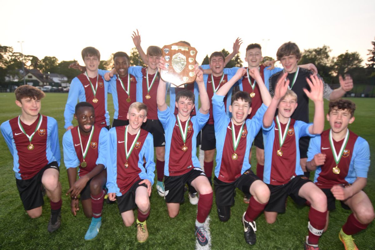 DeptPE's tweet photo. Congratulations to our Under 14 boys who became Warwickshire Cup Champions on Thursday night. They beat @MytonPE 4-1 at the Bedworth Oval. Captain Ryan Howley lifts the trophy after scoring a great hat trick.@StThomasMoreNun https://t.co/zbbC0kxsly