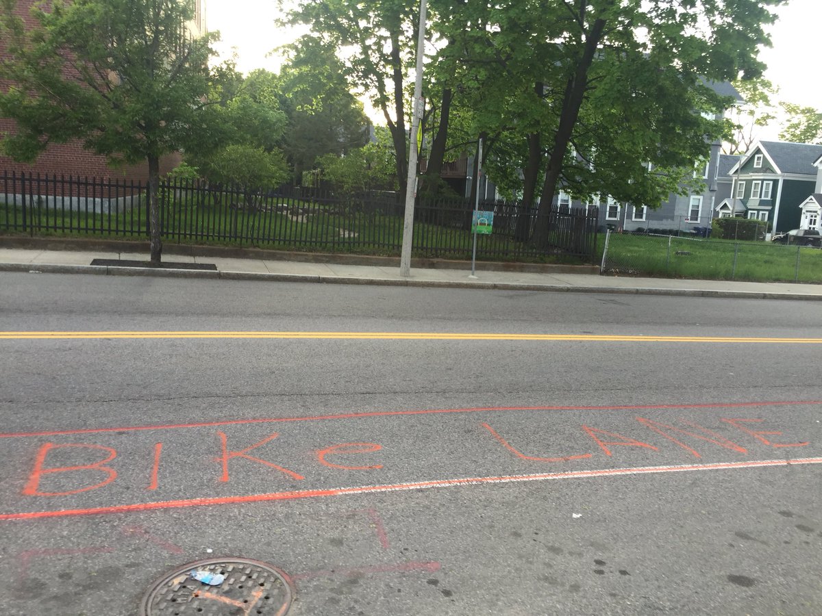 CoachBalto's tweet photo. Looks like someone is also tired of waiting for the bike lane to be repainted. If you did this I want to buy you a drink. #DemandMore #TacticalUrbanism #Roxbury https://t.co/74HKRtSaHQ