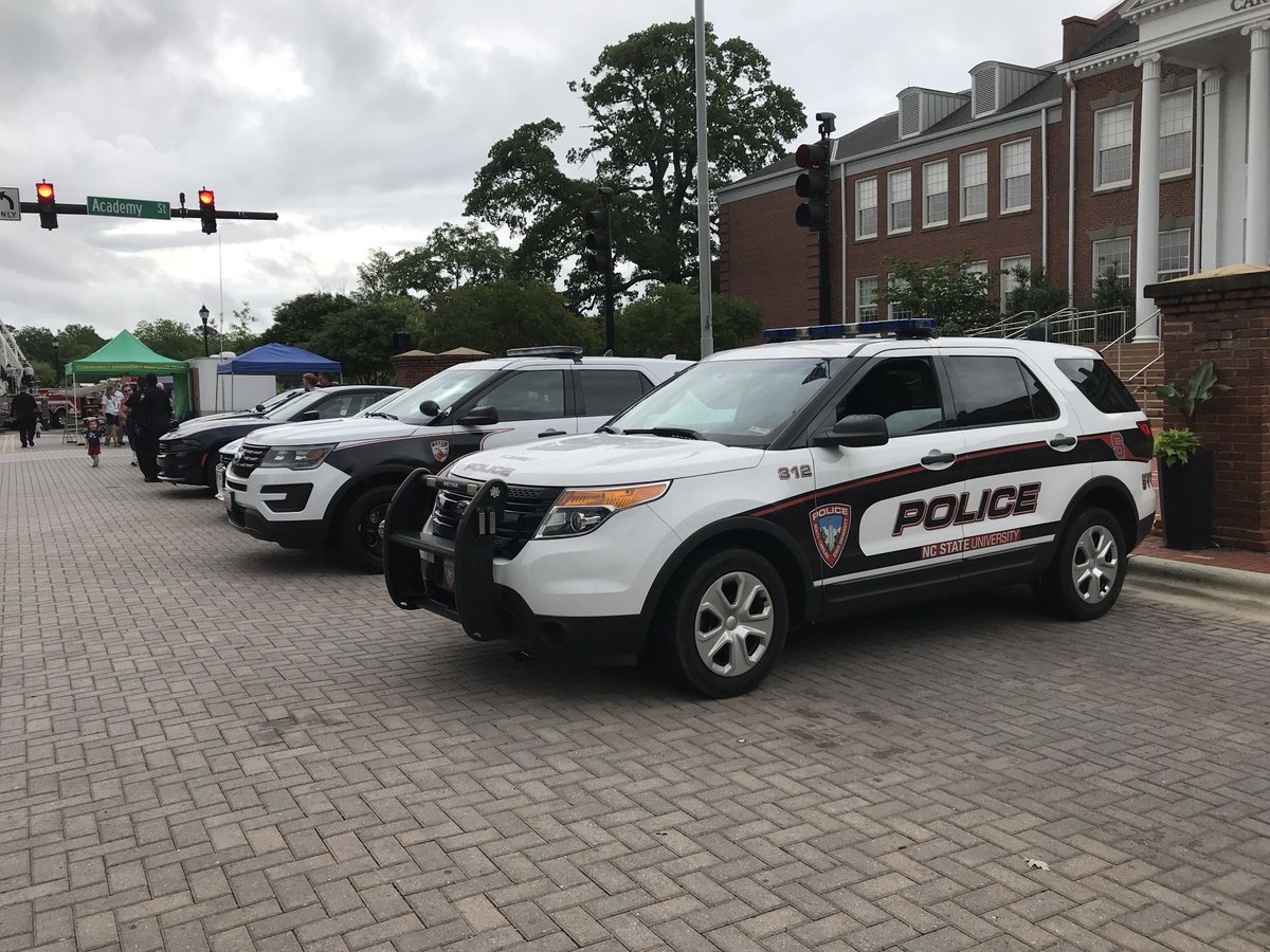 NCSUPolice's tweet photo. #PackPD is out at @TownofCary Public Safety Day with many partnering agencies and departments. Fun music and good food, despite the weather! #CaryPD https://t.co/WZEEsfR76C