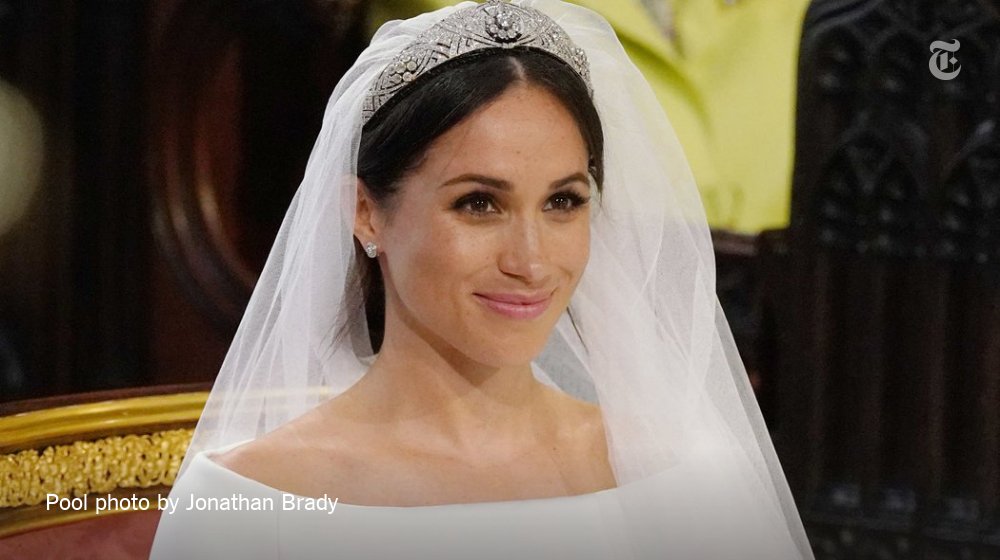 nytimes's tweet photo. Meghan Markle’s 16-foot veil was held in place by a diamond bandeau tiara that was loaned to her by Queen Elizabeth II https://t.co/UqjMfHoLkk https://t.co/iYrzgkrQW6