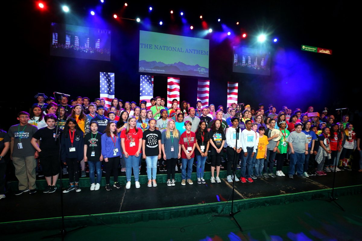 SOAlumniNetwork's tweet photo. Science Olympiad Opening Ceremony was a smash! 121 teams entered Moby Arena in the Parade of States and a student-led rendition of the National Anthem rocked the crowd! Thanks to Provost @Rick1Miranda and @russ_schumacher from @ColoradoStateU for the welcome! #SO2018CSU https://t.co/osgQvWzmTc
