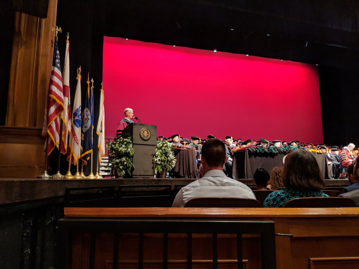 FSUCoM's tweet photo. Dean Fogarty delivers the opening address to the #FSUCoM Class of 2018 at today's graduation ceremony. #FSUDocs18 https://t.co/bsA1v7DuGo