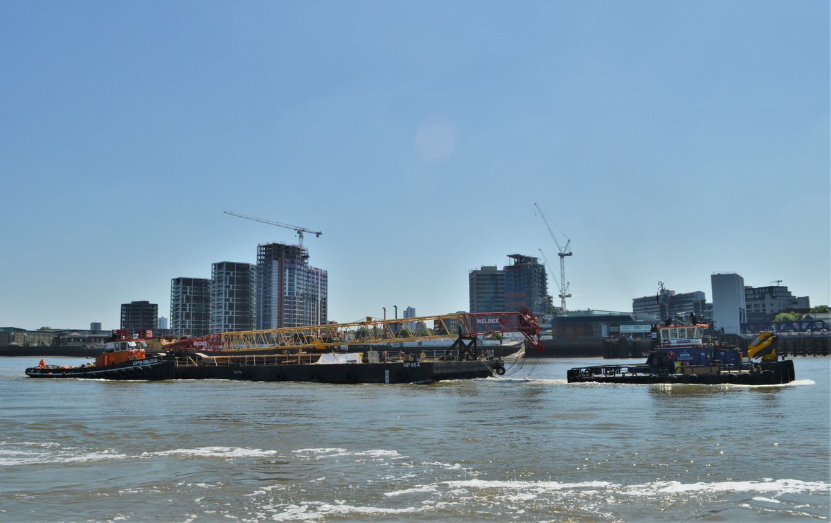 AJBC_1's tweet photo. .@CPBSMarine SHAKEDOG working with @gps_marine GPS IBERIA to move pontoon NP 464 with a #Weldex crane on it up the #Thames to #London #marineengineering #dlr_blog https://t.co/jIWBEw0Jdf