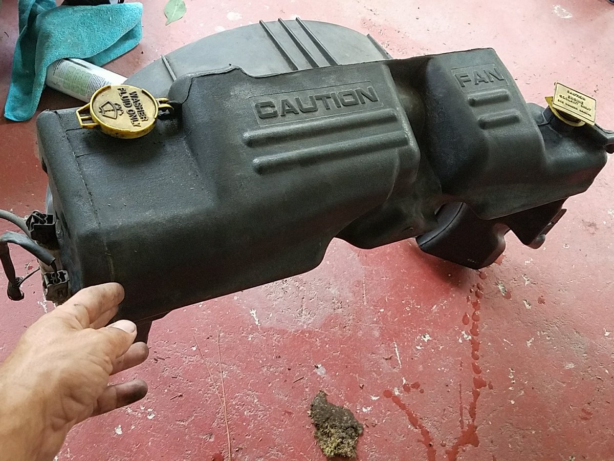 FrozenCrakk's tweet photo. So i needed a reservoir fan shroud for beast. geared up, tools ready... Get to junk yard... pay 2 dollars.... walk a mile to get to the part to pull it out, boom it's gone. Frustration sets in, anger.... oh shit right in the bed of the truck already pulled is my part! #winning https://t.co/v9n2IwhwIb