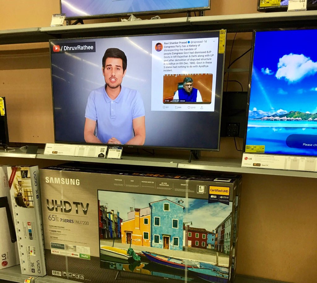 dhruv_rathee's tweet photo. Someone sent me this photo from San Diego, California. 

A Walmart Store has my video playing on one of their display TVs :) https://t.co/jk0sFp8L3W