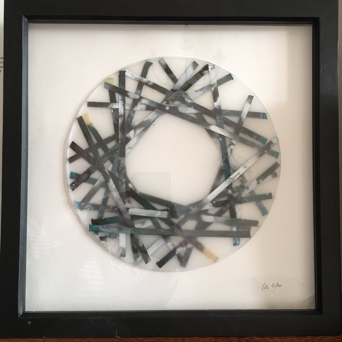 EllieClewlow's tweet photo. It has only taken me a week to unpack and find a temporary home for this lovely piece (painted paper encased in wax) by @BuftonKate #paper #crafts #booktransformations #bookarts (And no, I haven’t just put a piece of wax above a working fireplace!) https://t.co/3M7E2YzFGr