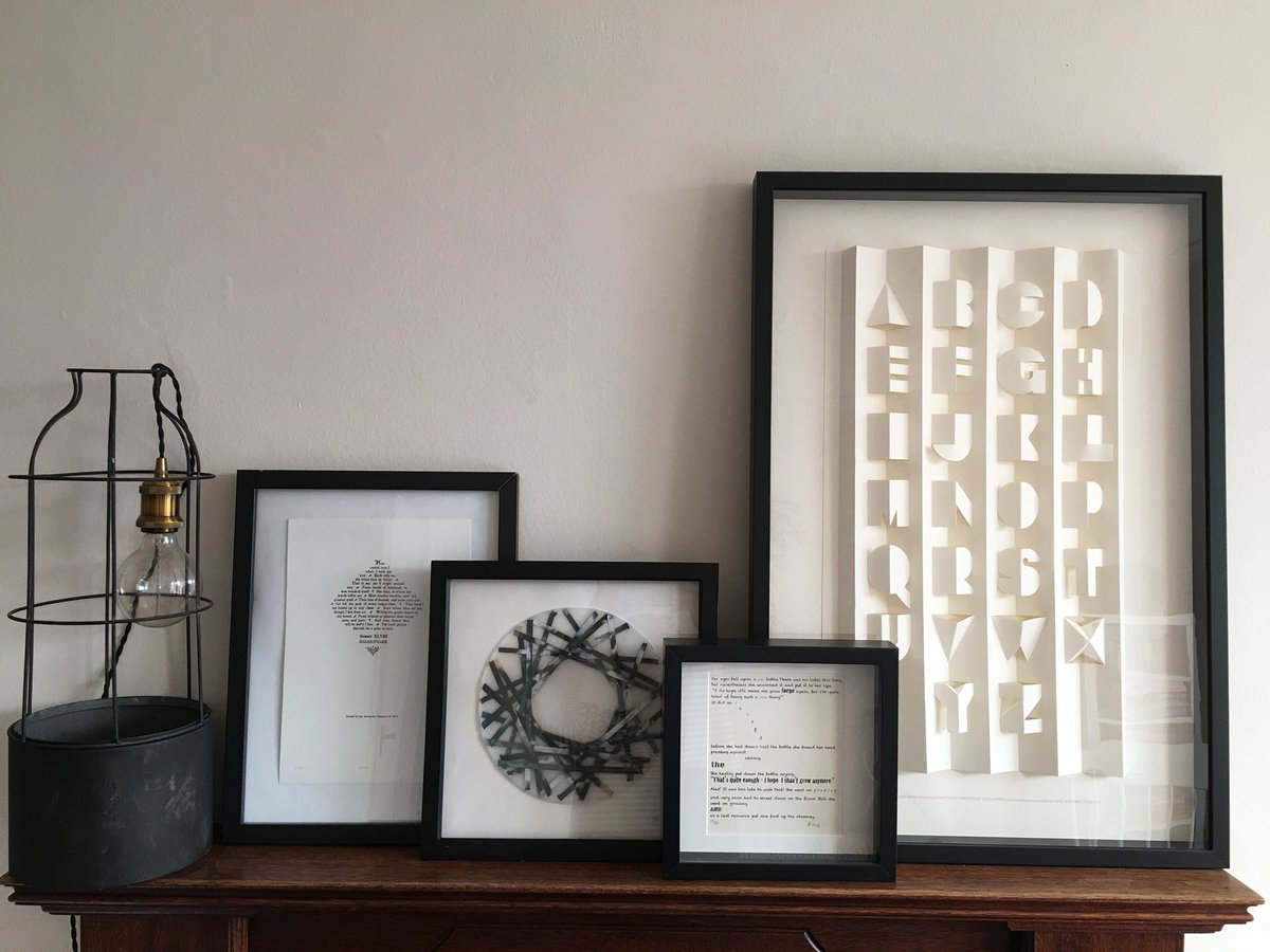 EllieClewlow's tweet photo. It has only taken me a week to unpack and find a temporary home for this lovely piece (painted paper encased in wax) by @BuftonKate #paper #crafts #booktransformations #bookarts (And no, I haven’t just put a piece of wax above a working fireplace!) https://t.co/3M7E2YzFGr