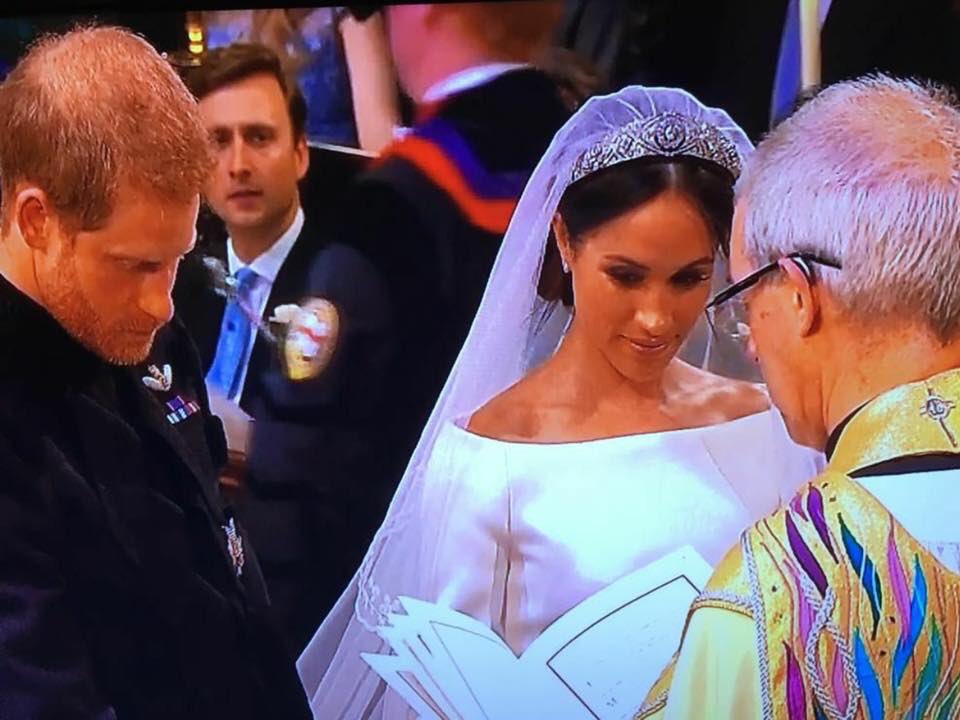 animasaudiology's tweet photo. “Who are you wearing?” had a whole different meaning for Audiologists during the Royal wedding. We weren’t looking at Meghan Markle’s dress or the attire of Prince Harry’s family...check out those fabulous hearing aids on the priest marrying them! #royalwedding #hearingaids https://t.co/2wxJ7eC7F7