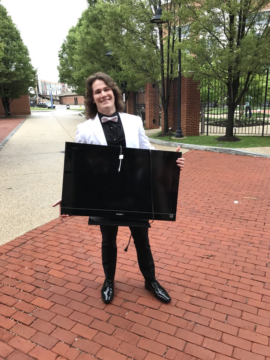Annapolis2018's tweet photo. He wanted to watch the CAPS game at prom! 

Most creative date in history! https://t.co/LYIxYZpAPv