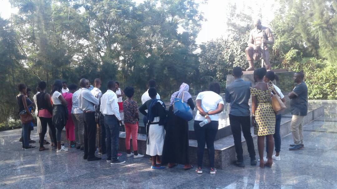 aimemuyombano's tweet photo. #KacyiruSector Youth representative @KacyiruYouth20 @Gasabo_District took step with determination as new generation "never again" #Kwibuka24 while were being taught about @RwandaParliamnt background &amp; #CAGMuseum. https://t.co/GqdoNzsbN1