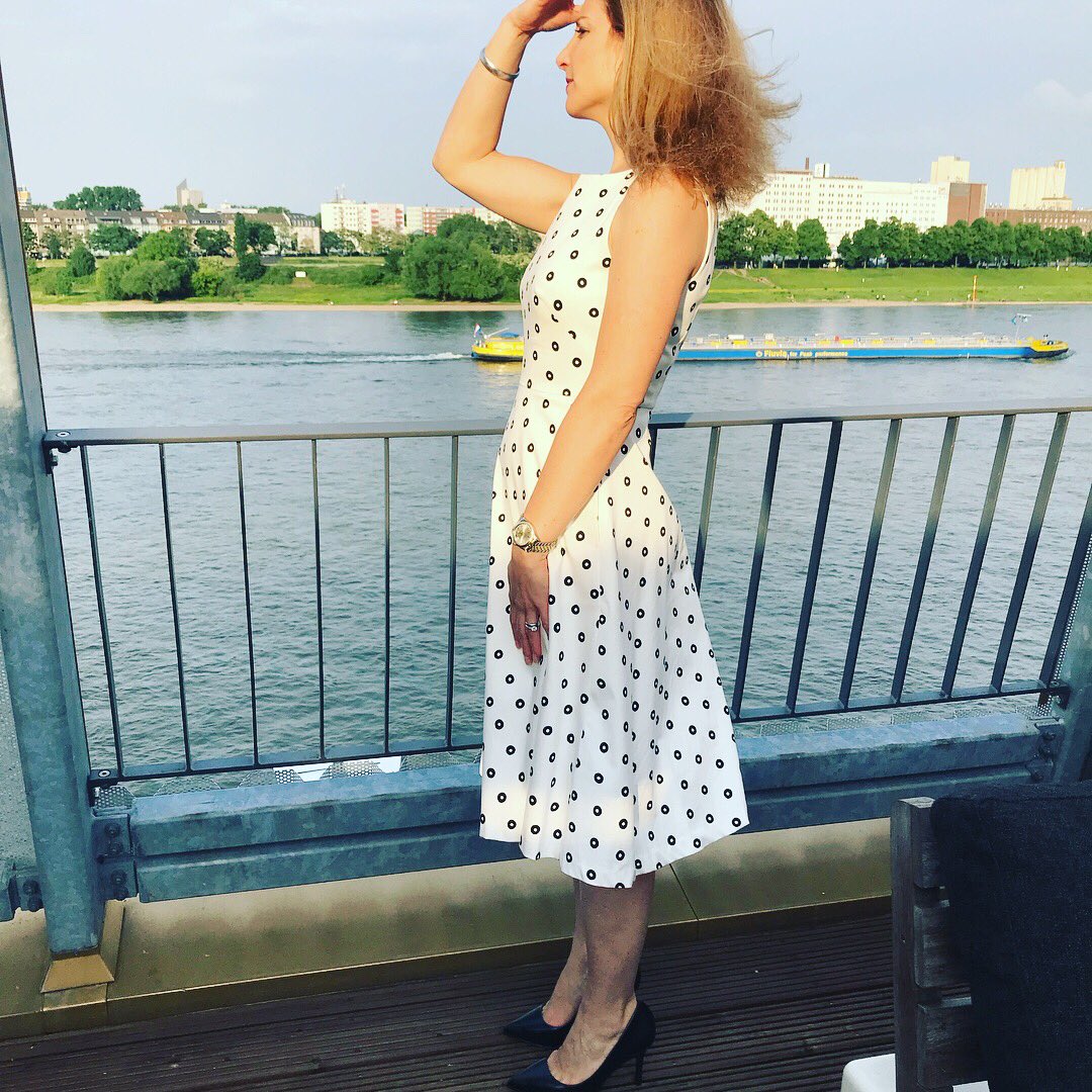 Styles4Work's tweet photo. White dress with black loops and black pumps for a semi-formal and sunny business lunch or business dinner when sitting outside. #styles4work #stylesforwork #businesslunch #businesslook #businesswomen #officestyle #officelook #businessdress #businessfashion #businessweekend https://t.co/bWVqPxl1de