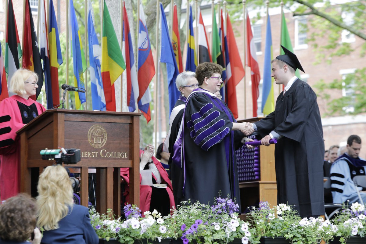 AmherstCollege's tweet photo. No fear of rain could keep our graduates from taking this stage by storm. Congrats, Mammoths! #Amherst2018 https://t.co/yQU5J25pN6