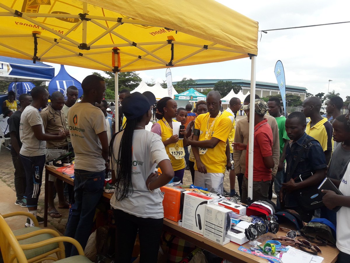 Olado_RW's tweet photo. At Marathon Village OLADO Team showing runners how to Buy &amp; Sell  Online at https://t.co/TNPJt0JByX an Pay with @MTNRwanda MTN MoMo.
#KIPM2018 @KigaliMarathon @CityofKigali @ICTChamberPSF @Olado_RW https://t.co/QdBYHpv8v4