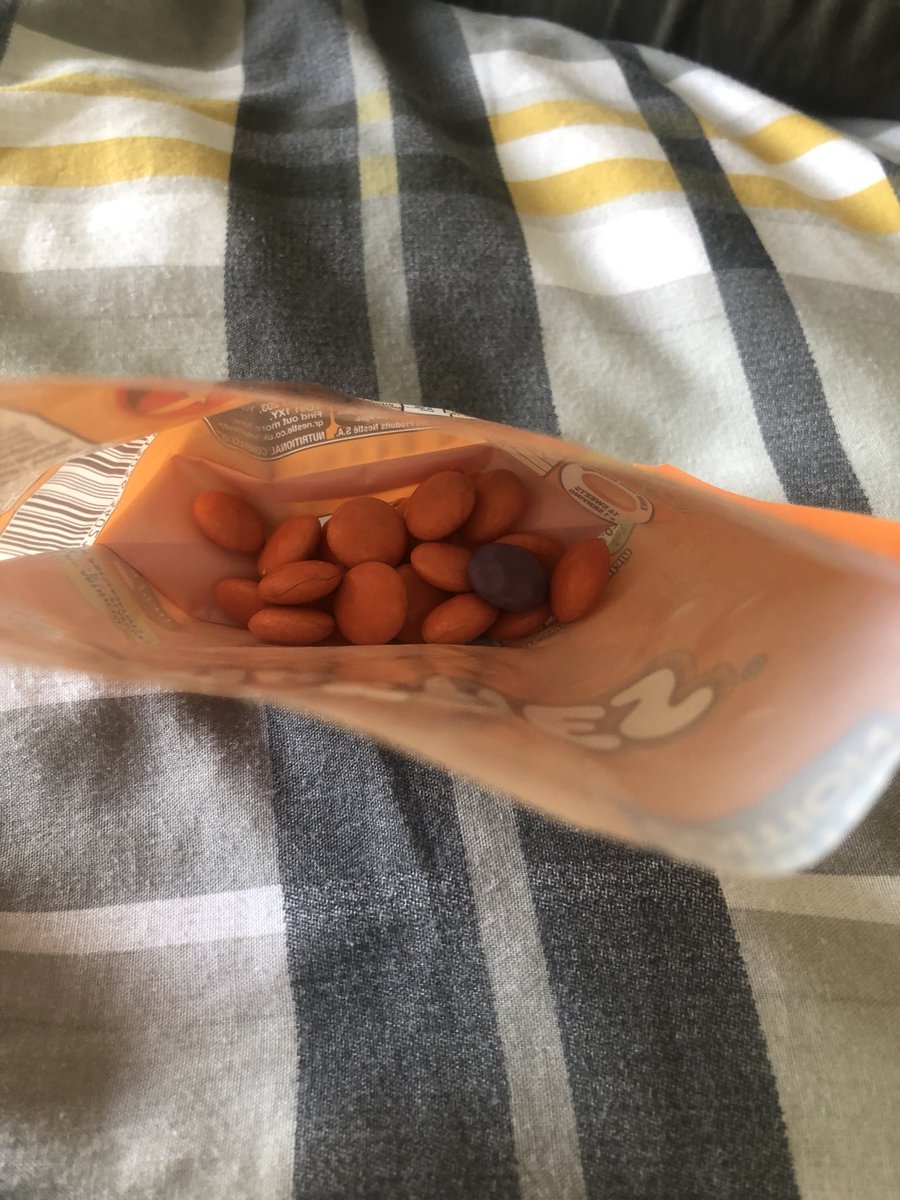 FranCassx's tweet photo. @NestleUKI I found a purple smartie in my bag of orange smarties... is this a secret competition I’ve won?! https://t.co/uN9QqKQdPN