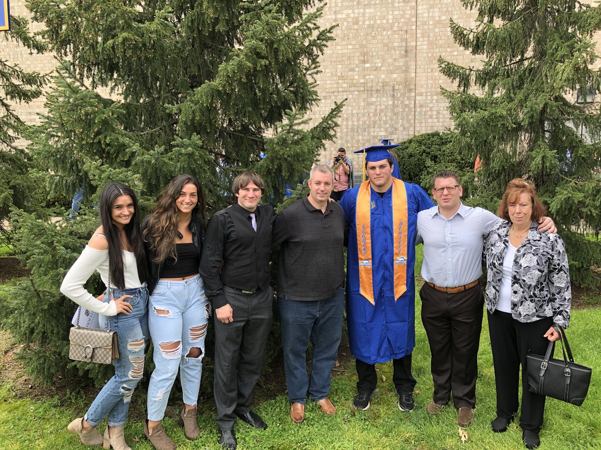 HofstraWREST's tweet photo. Check out the graduation pictures from today! We had Mike Hughes and @Bobby_Fehr walking and we are very proud of both of these young men. Excited to call them Hofstra Alumni! #StrengthInPride #PrideGraduation #Classof2018 https://t.co/FrYEj5XaaZ