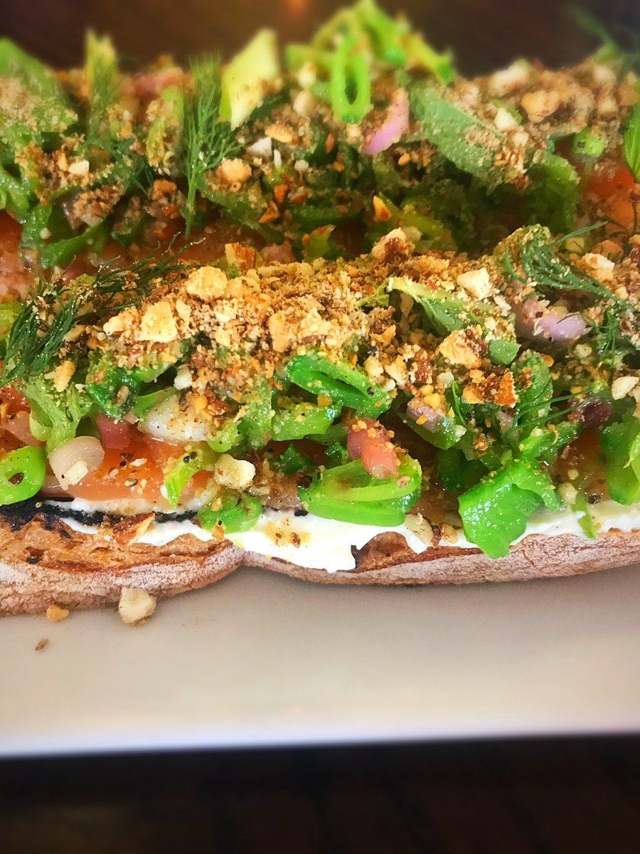 Cured salmon ricotta toast with snap peas, ramps, mint, and dukkah <a href="/RappOysterBar/">RappOysterBar</a> inside <a href="/unionmarketdc/">Union Market District</a>.