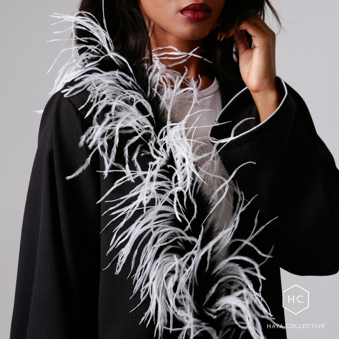 HayaCollective's tweet photo. A flutter of feathers lends to the glamour of this Abaya. 

Shop Paloma Abaya (R999) at https://t.co/rCfNxtq764. 
Eid ‘18 orders close at midnight tonight.

#OstrichFeathers #Feathers #Fashion #Abaya https://t.co/U7jReWEbpL