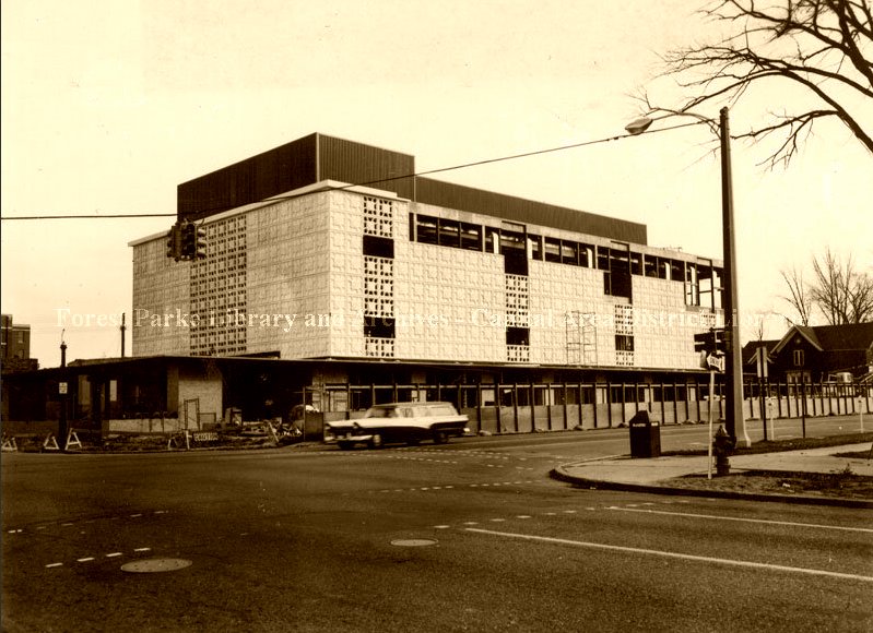 cadl's tweet photo. Did you know CADL Downtown Lansing used to have a lot more windows?
Just kidding - those are holes! Pictured is the library in the early 60s, still under construction. #sepiasunday https://t.co/sAkGdwtvOS https://t.co/UWYbBFZXbu