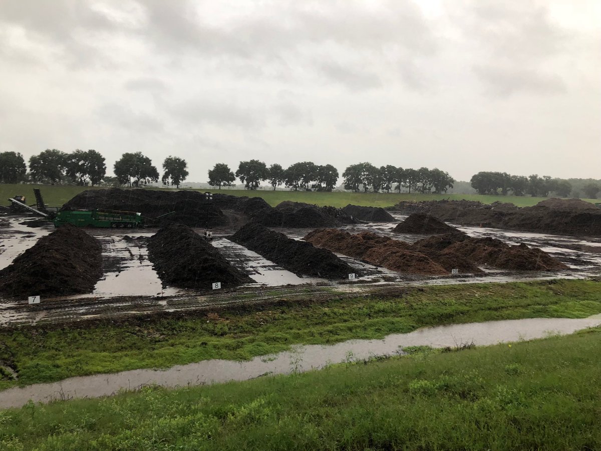 FlaOrganics's tweet photo. To some, this looks like a muddy mess. To me, it looks like our windrows full or organic matter are receiving an appropriately watered. #soil #soilhealth #organic #organics #sustainability #carbongoals #freshfromflorida #ClimateAction https://t.co/UWZ649VNEK