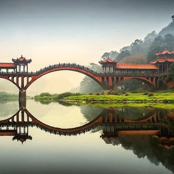 African_bea's tweet photo. A bridge near the Leshan Giant Buddha Statues Grottoes in Sichuan province, China🇨🇳🇨🇳 https://t.co/XfAouTjlGW