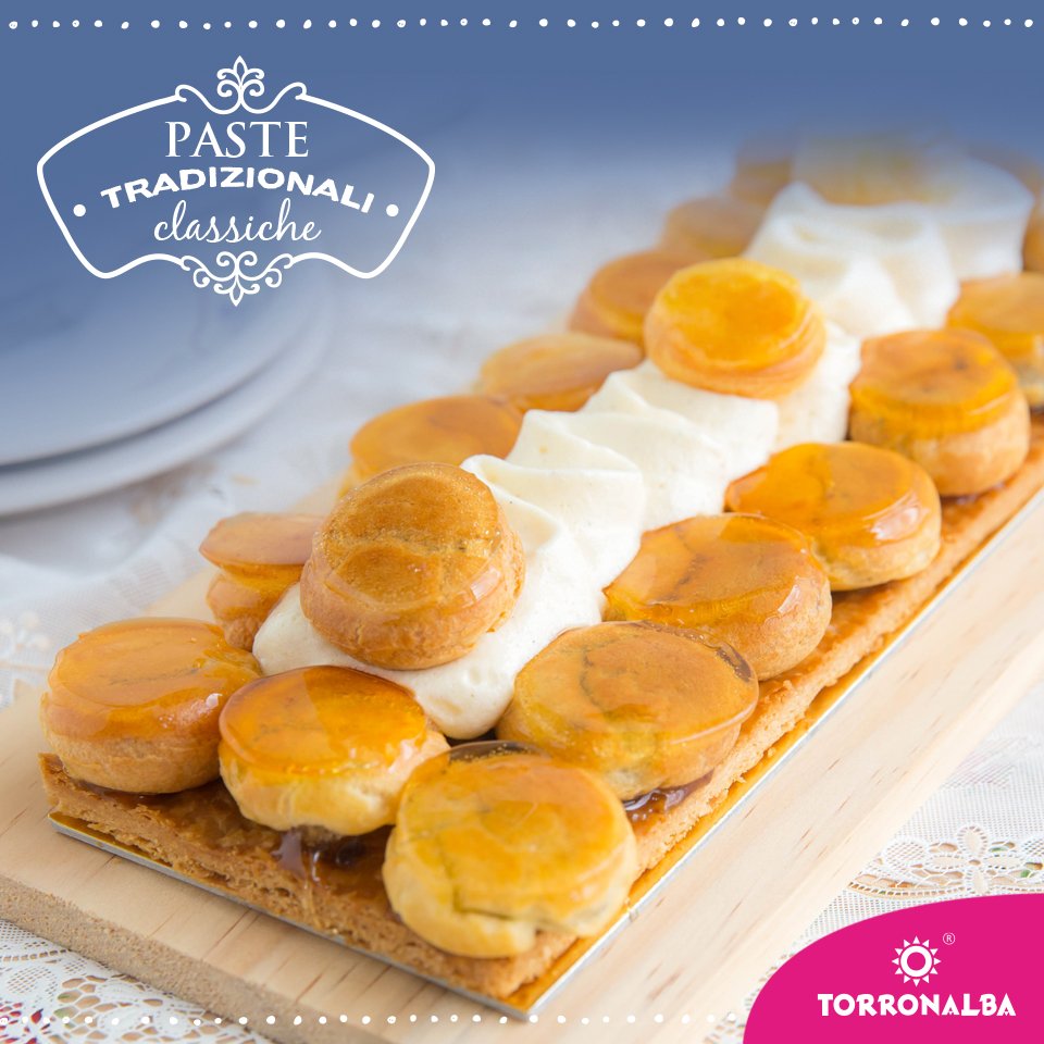 Torronalbasrl's tweet photo. A pastry lover's dream, this gateau St. honore is made with golden #puffpastry, cream puffs, creme Chantilly, and salted caramel! You can find our traditional st honorè paste here: https://t.co/BkFuXrwRon https://t.co/n4yomRIfwO