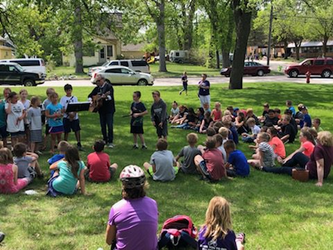 CHARGERSDE's tweet photo. Dassel Elementary hosted an outdoor concert in the park near the school.  Thank you to Charlie Maguire, our Third Grade Team, and all those involved with the program. #WeRDC #DasselRocks https://t.co/0m5OUa6jsQ