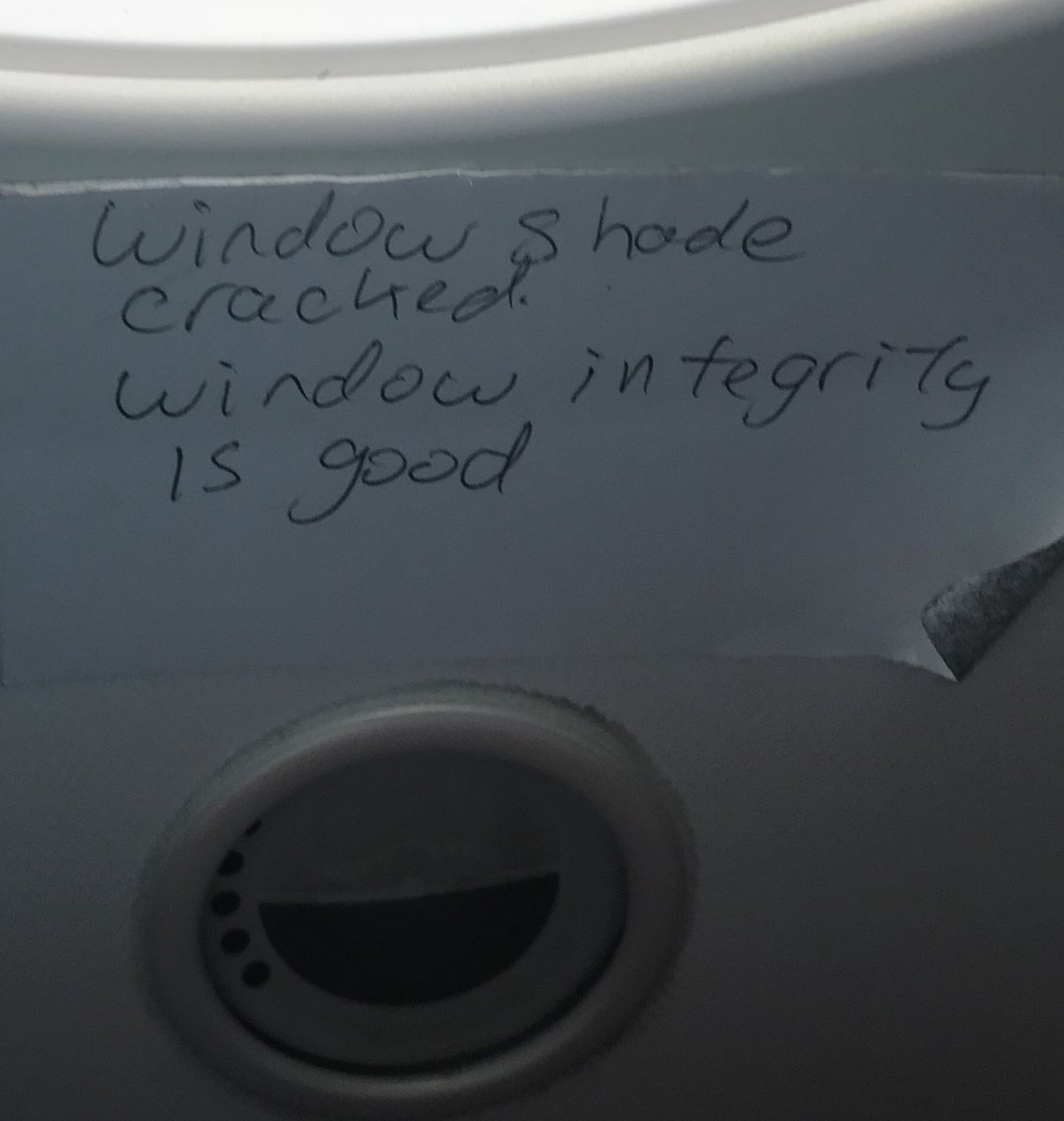 Thorntontrg's tweet photo. When your flying #AmericanAirlines across the pond for 13 hrs and your window is cracked, it’s comforting to see this sticker #fixyourplane https://t.co/e0jdIoMq4g