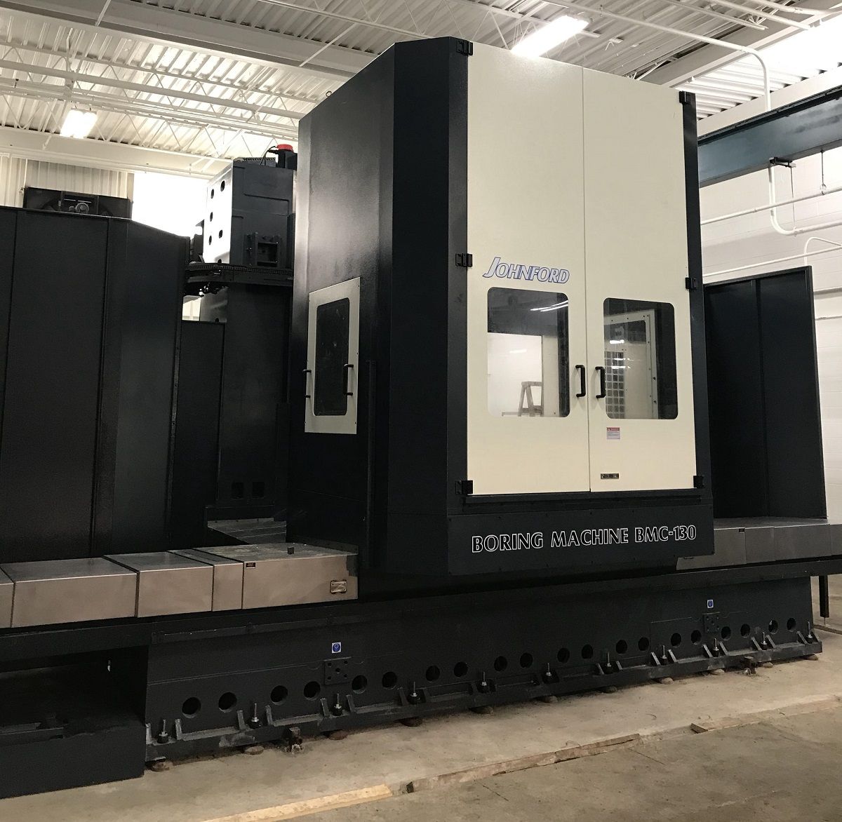 AbsoluteMachine's tweet photo. Another successful install by the Absolute Machine Tools service team for a good Northwest Ohio customer of ours! This 88,000 lb. beast is a #Johnford BMC 130 #HorizontalBoringMill. Read more about the Johnford BMC Series: https://t.co/L3imiMjneF https://t.co/YhoZtSByxN