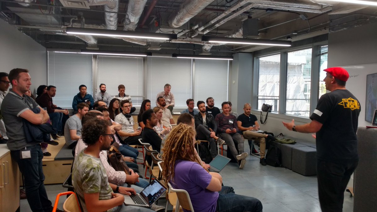 Dave introduces the event to the room full of people