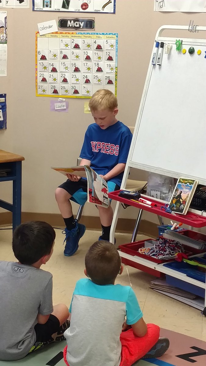 mrspeterskg's tweet photo. So blessed to have a former student visit to read to us today! #greatreader @CarrieHower @NBEbulldogs https://t.co/J5ZuPZ9a5V