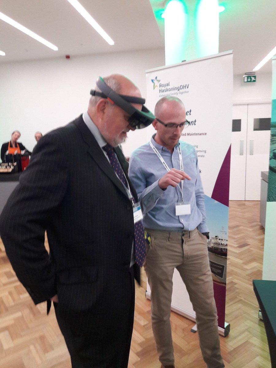 NickiClay's tweet photo. @cwgshields trying the Hololens! #ukports18 @RHDHV_UK @RHDHV_Maritime https://t.co/GO8t8wQw2b