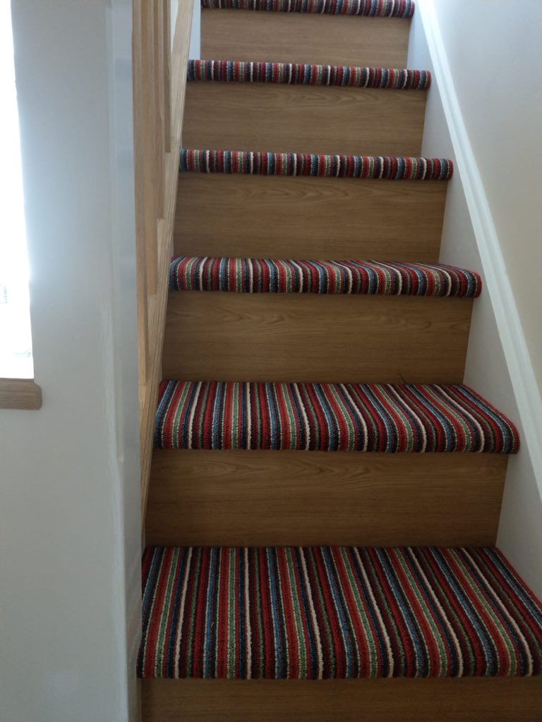 CarpetsCrosby's tweet photo. @iLoveEveryStep contemporary stripe poppy to the treads and 9’ oak LVT to the risers https://t.co/EjVT6fOzys