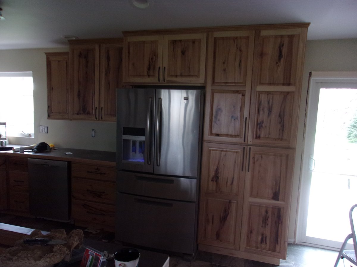 Here are some pictures of the latest custom kitchen we have made and installed. It is Rustic Hickory with raised panel doors and slab drawer fronts all with soft close hinges and drawer slides. To get your free estimate please call Cabinets Plus at (269)948-9774 and talk to Bill!